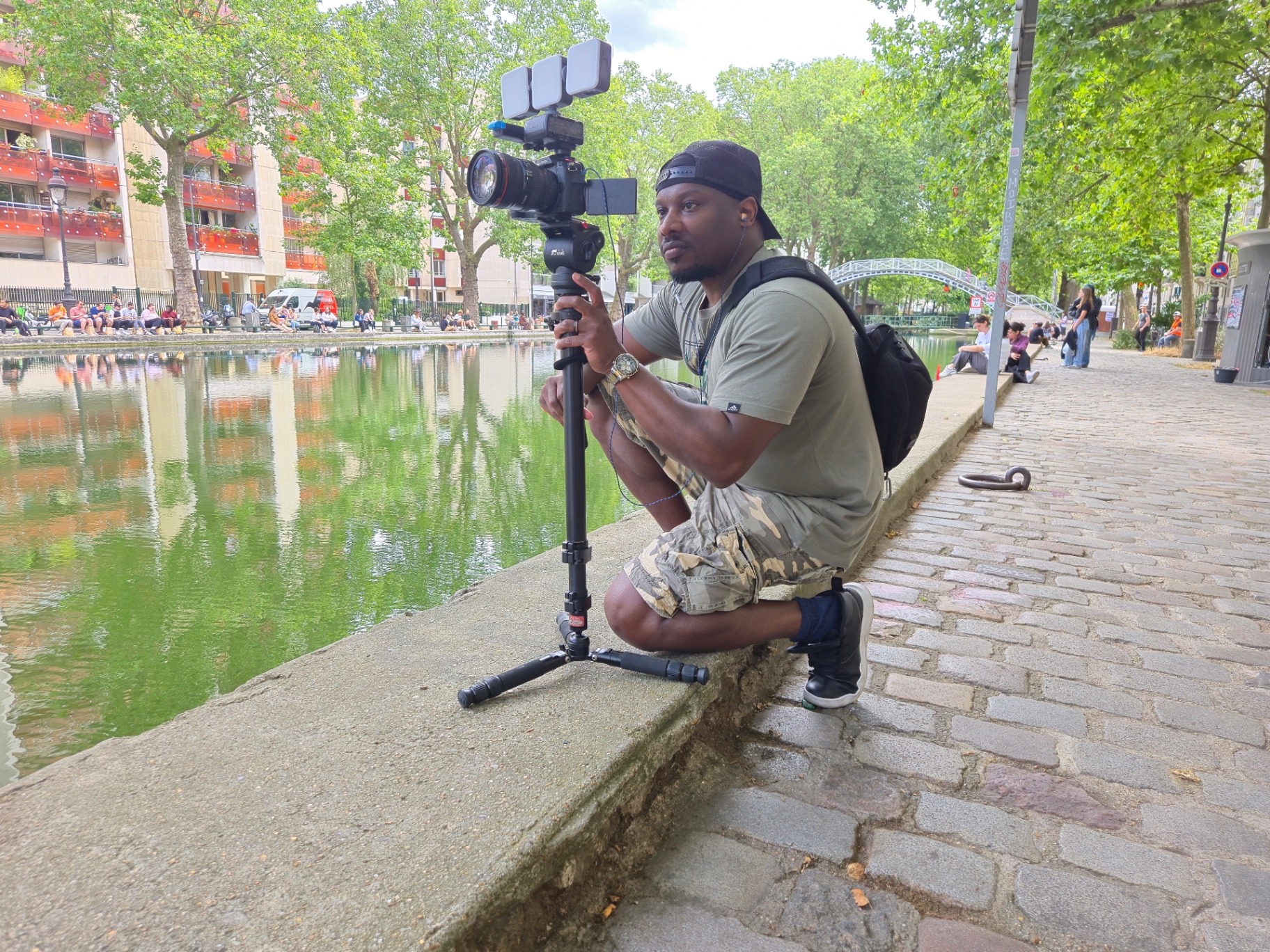 Filmmaker with professional camera rig on location